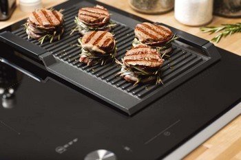 Kan een gietijzeren grillplaat ook op een inductie kookplaat gebruikt worden?